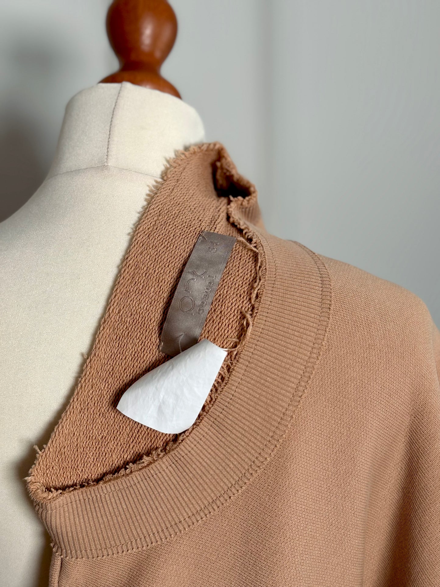 Ripped beige sweatshirt