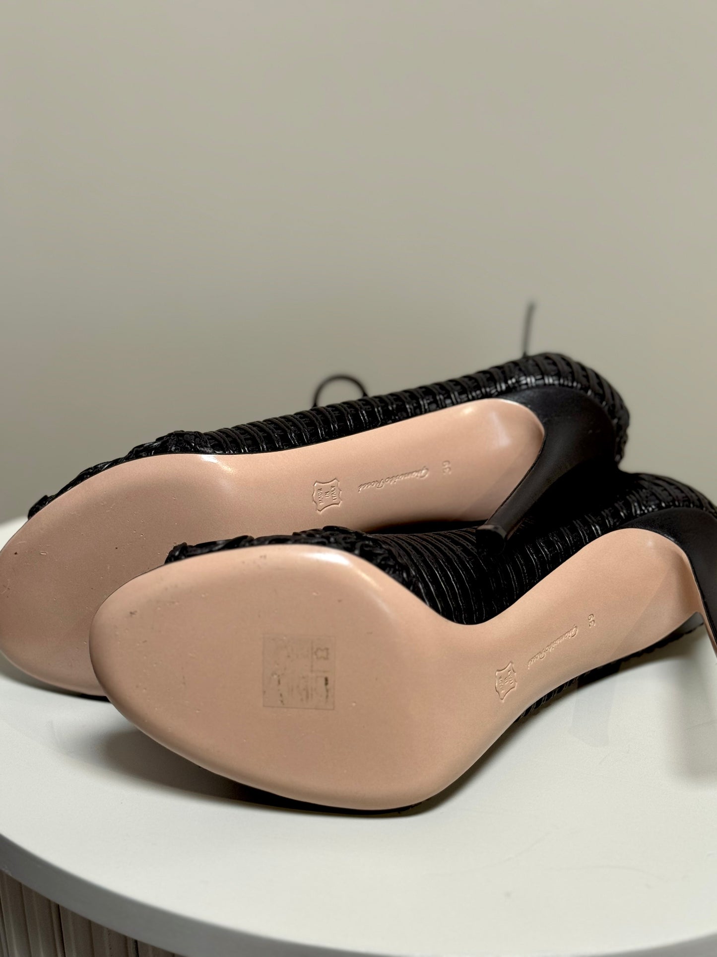 Open toe boots in soft black leather