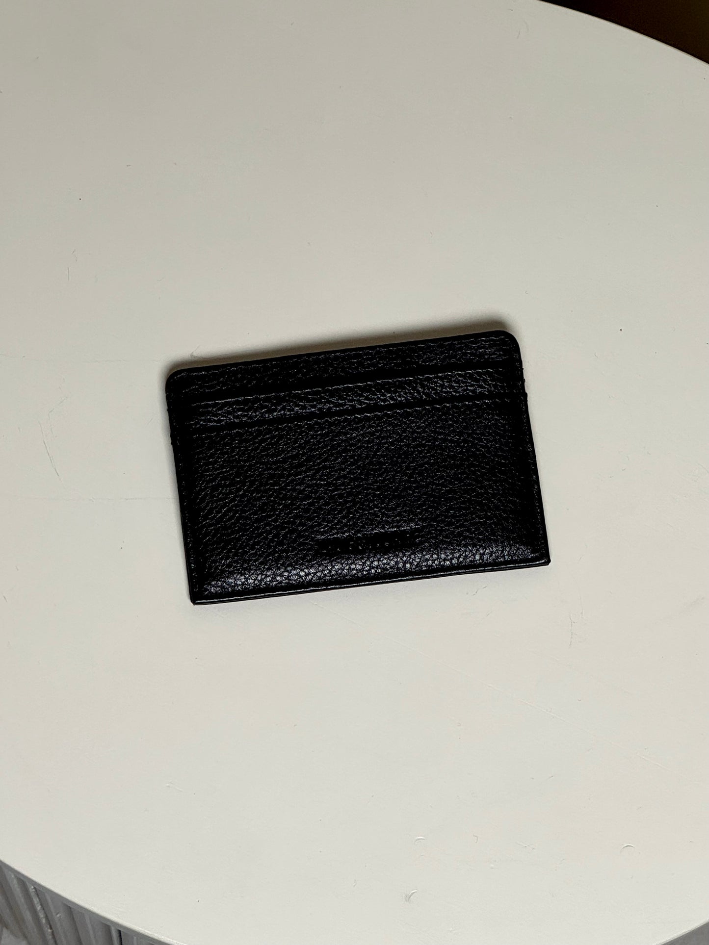 Wing-charm leather cardholder