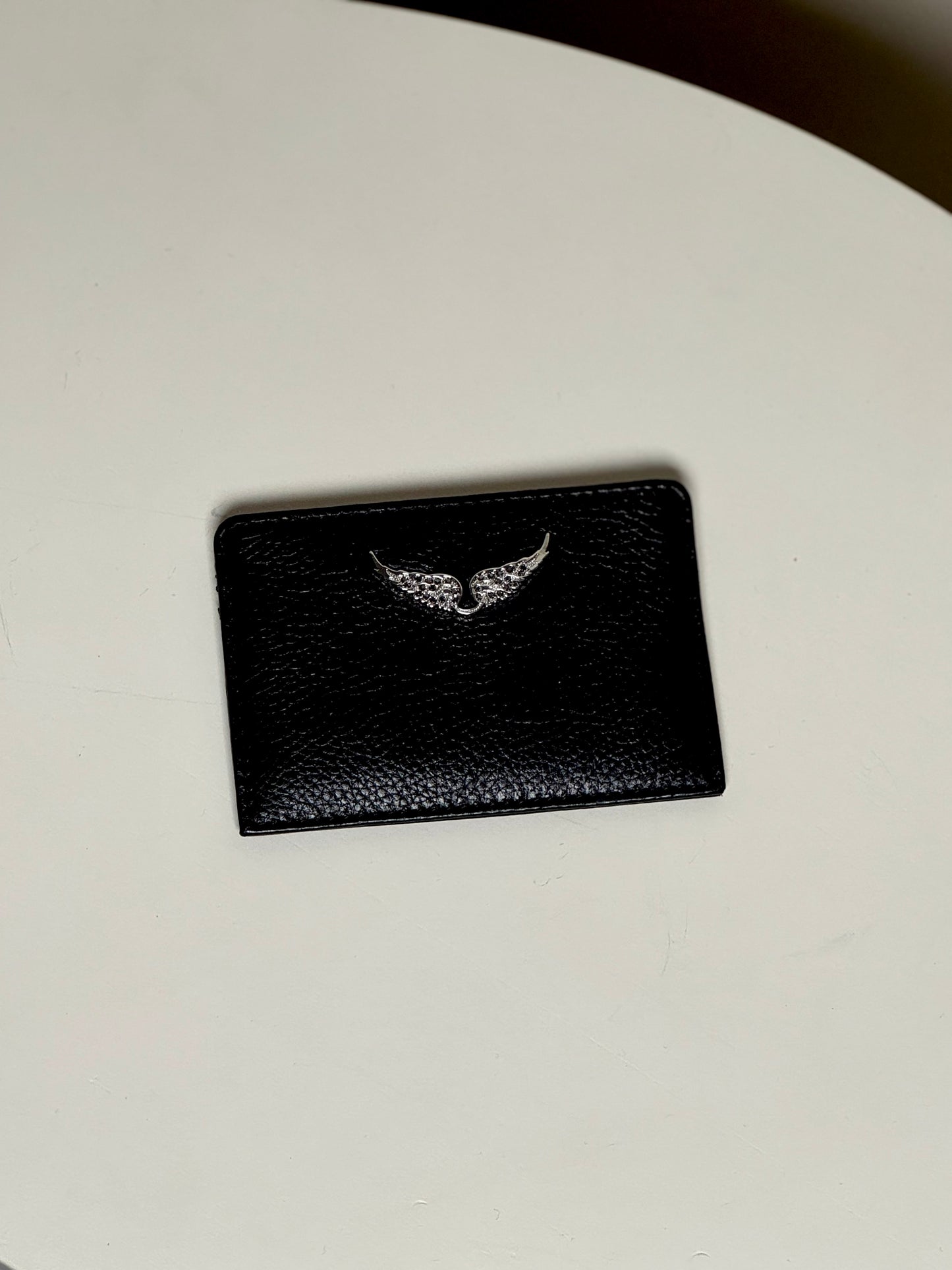 Wing-charm leather cardholder