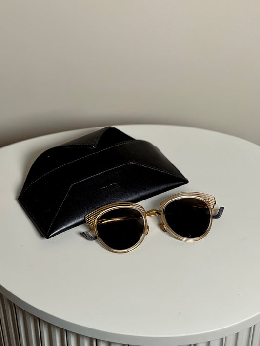 Sunglasses with gold frame
