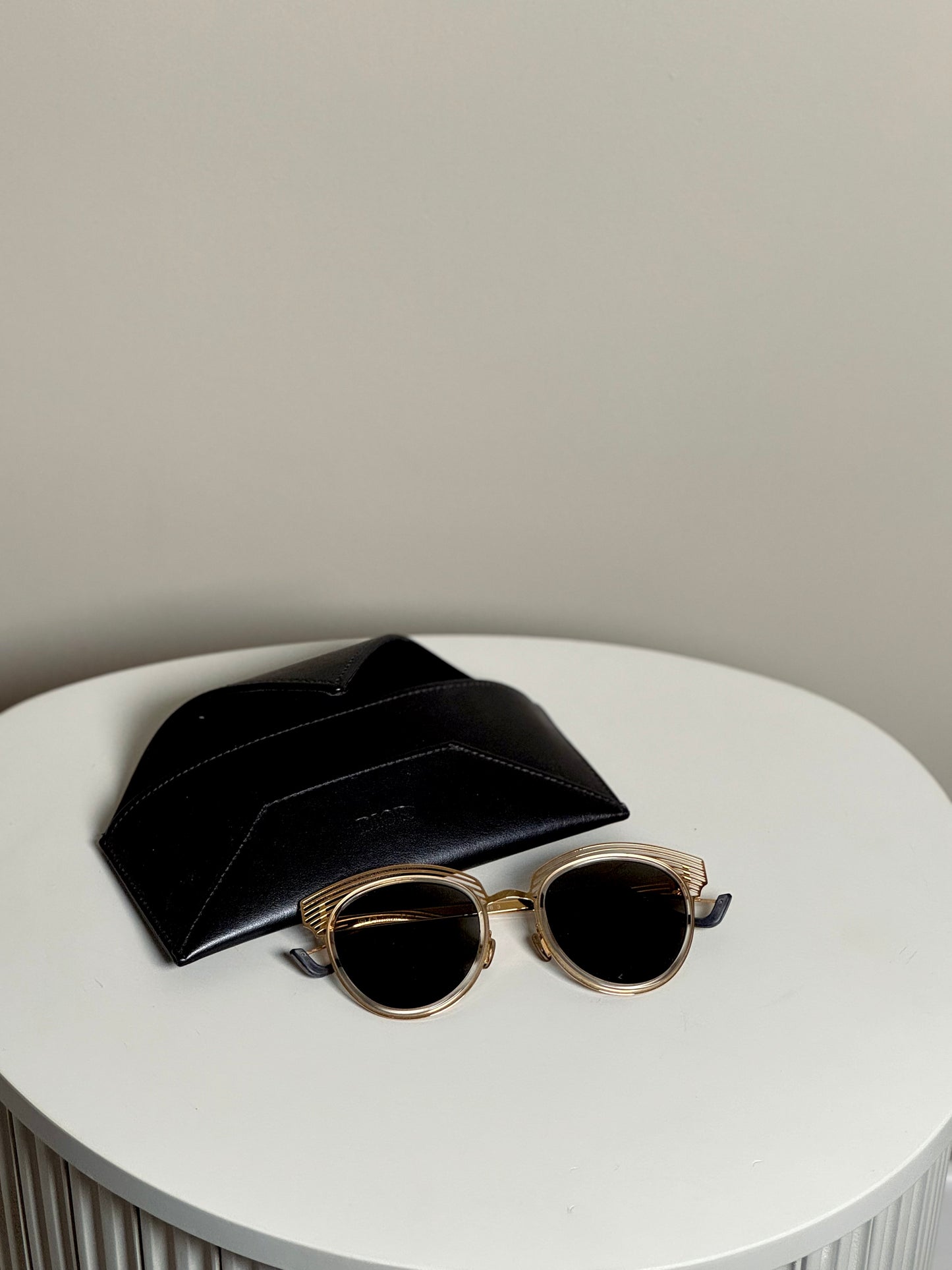 Sunglasses with gold frame