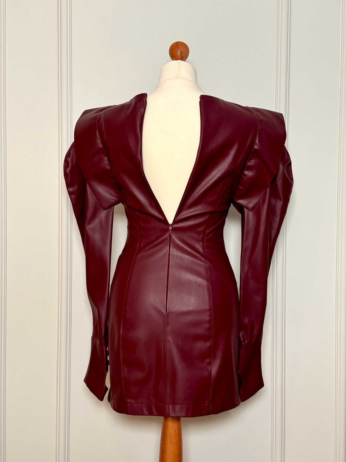 Burgundy faux leather dress with oversized shoulders