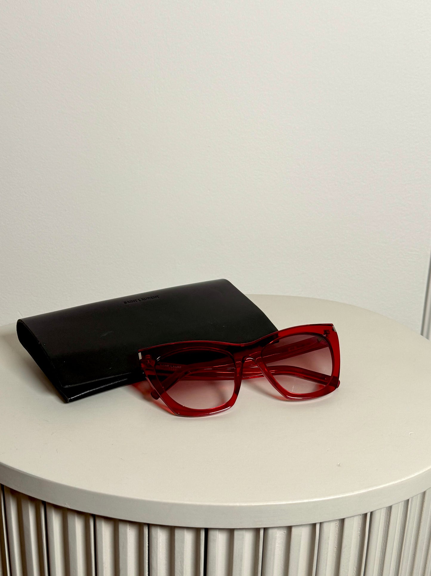 Red semi-transparent sunglasses